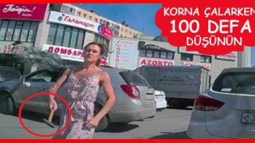 Kadın sürücü kendisine korna çalan araca çekiçle saldırdı!