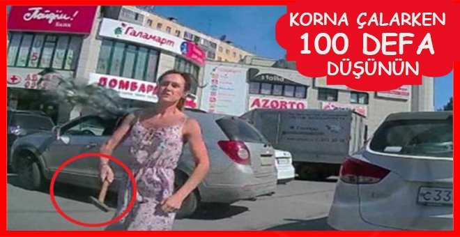 Kadın sürücü kendisine korna çalan araca çekiçle saldırdı!